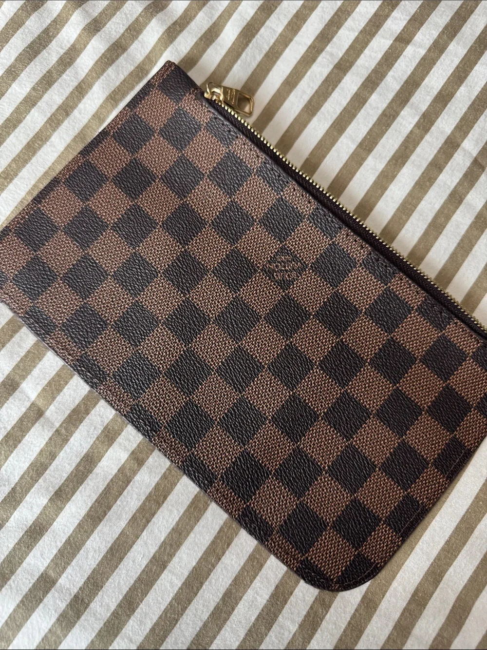 Louis Vuitton **price reflects